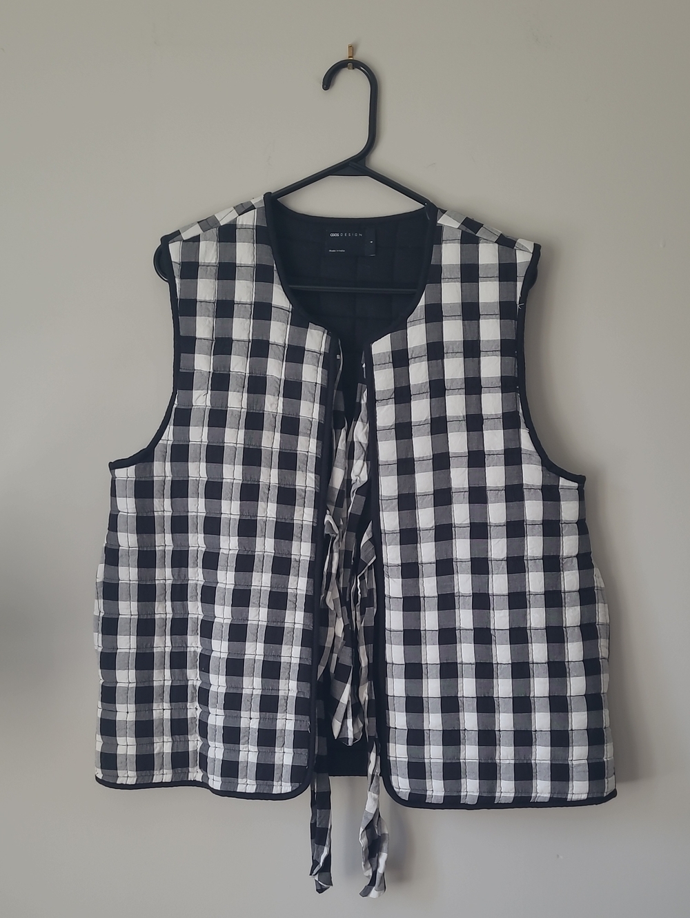 ASOS DESIGN Quilted Gilet With Bows In Mono Gingham